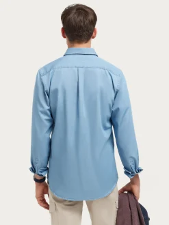 POLERA DENIM CELESTE